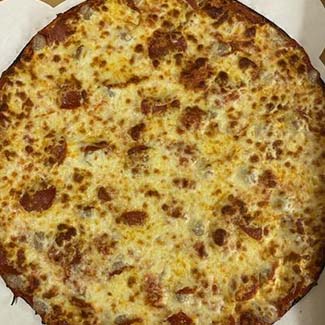 A Speciality Pizza made with Meats prepared at Butch's Pizza The Best Pizza in Kimberly, WI