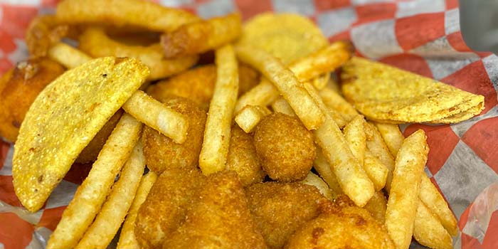 Butch's Pizza in Kimberly serves the best French fries, breaded mushrooms and mini tacos combo apps from their appetizer menu